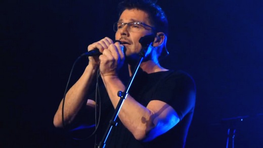 Morten, sporting a Movember moustache, on stage in Oslo last night (Screenshot from YouTube video)